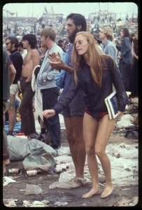 View of the audience listening to the music at the Woodstock Festival