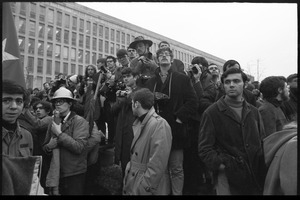 Anti-Vietnam War protesters and onlookers with cameras during the Counter-inaugural demonstrations, 1969