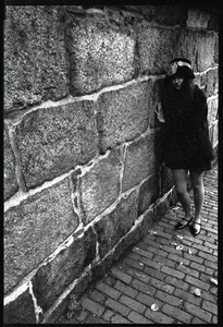 Sarah leaning against a stone wall, Beacon Hill