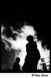 After the Maypole celebration, Packer Corners commune: silhouette and bonfire