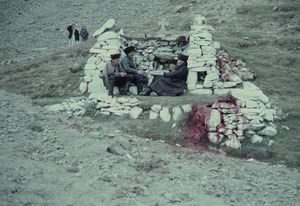 Men at the place of sheep sacrifice