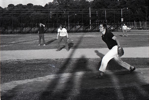 Boston Phoenix vs. WBCN staff softball game: Pheonix staff members in the field, Harper Barnes at shortstop and Stu Werbin in the outfield