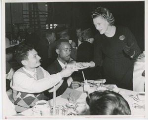 Helen Menken serving clients at Thanksgiving dinner