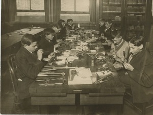 Young men in a jewelry workshop