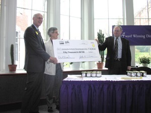 Congressman John W. Olver presenting USDA check to Community Involved in Sustaining Agriculture (CISA)