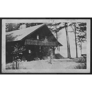 View of cabin and trees at unidentified YMCA camp