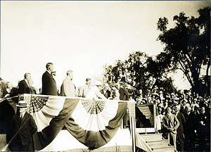 Mrs. Calvin Coolidge, presented with flowers at flag raising on Lynn Common, August 1925