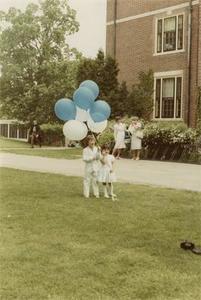 Children Holding Balloons.