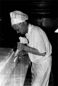 Chester Babcock Decorating Cake.
