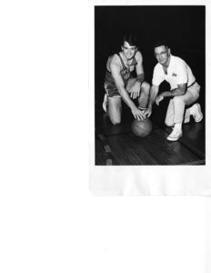 Suffolk University men's basketball player Walter "Buddy" King with Coach Charles Law, 1969