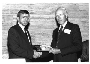 Suffolk University Dean Richard McDowell (SBS) and Professor Warren Briggs (SBS) at the 1989 Deans' Reception service award ceremony