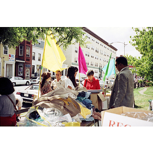 Shoppers at an outdoor sale