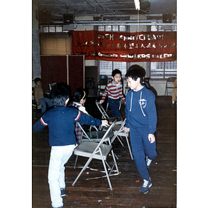 Children playing at Chinese Progressive Association anniversary event