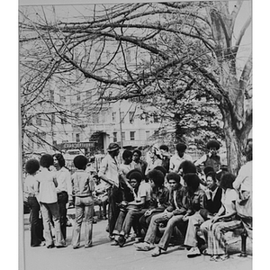 African American students gather under the meeting tree at Northeastern University