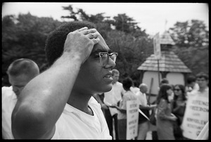 Robert Parris Moses scratching his head as the march gathers