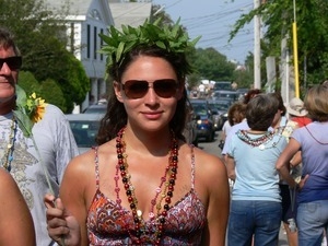 Parade marcher with laurel wreath on her head : Provincetown Carnival parade