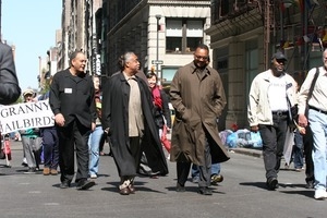 Jesse Jackson (buttoned coat) and Al Sharpton leading the march opposing the war in Iraq