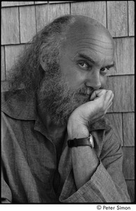 Ram Dass at typewriter: Portrait of Ram Dass