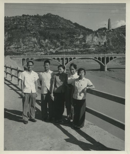Shirley Graham Du Bois with two unidentified men and two women in front of the Provincial Road Bridge in Yan'an, China