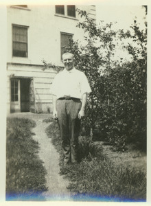 John S. Bailey standing outdoors