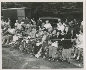 Wheelchair users watch event