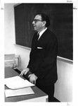 Suffolk University Professor Dion J. Archon (CAS) teaching in classroom, photograph, circa 1960s