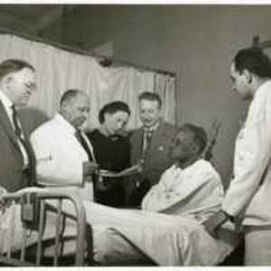 Louis T. Wright and colleagues at patient bedside, Harlem Hospital, New York, N.Y.