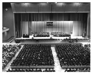 View of the audience and dignitaries on stage a the 1970 Suffolk University commencement