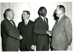Dean Frederick McDermott (Law) and President Dennis C. Haley (1960-1965) and others at Suffolk University's Law Day, 1962