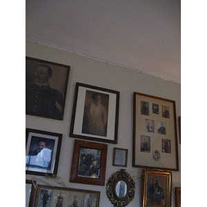Historical photographs on Reverend Chauncy Moore's wall