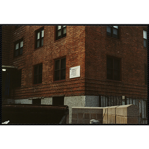 Franklin Field Teen Center sign affixed to an outside wall of the building