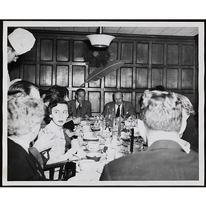 Executive Director of Boys' Club of Boston Arthur T. Burger (right, head of table) and fellow diners attend a Tom Pappas Chefs' Club sponsored dinner