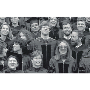 Smiling graduates at the School of Law commencement ceremony for the Class of 1987