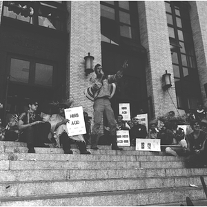 A Mayor of Huntington Avenue candidate speaks from the steps of Ell Hall