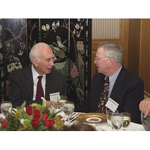 Guests speaking at the gala dinner in honor of John Hatsopoulos