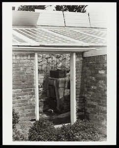 Exterior view of the 1800 Lyman Estate greenhouse looking inside