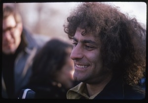 Abbie Hoffman, smiling in a crowd