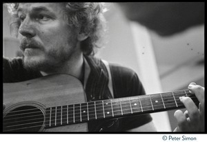 Gordon Lightfoot: half-length portrait, playing guitar