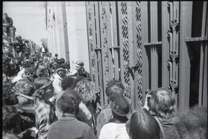 May Day demonstrations and street actions by the Justice Department: protesters at padlocked gate
