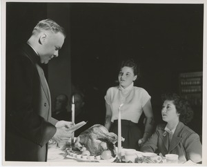 Reverend Thomas G. Hagerty and clients at Thanksgiving dinner