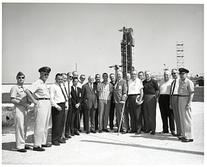 Mayor John F. Collins and Alan Shepard with group of unidentified men at Air Force Eastern Test Range, Cape Kennedy (now Cape Canaveral)