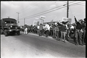 Antiwar demonstration at Fort Dix, N.J.: Arrival of Army trucks