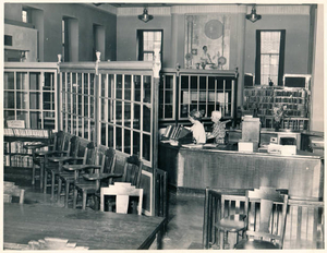 My aunt at the circulation desk at the Faneuil Hall branch library (BPL)