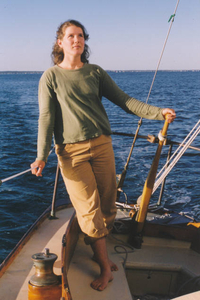 Lily K. Morris at the helm of Sanderling