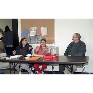Ballot box and election volunteers during the election for Inquilinos Boricuas en Acción's new Board of Directors.