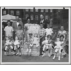Five winners of the Boys' Club Little Sister Contest pose with their brothers and the panel of judges, including Mary Ann Mobley, Miss America 1959, and Donald M. DeHart, at right