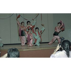 Youth perform traditional Chinese dance on stage at Chinese Progressive Association's Fifth Anniversary Celebration