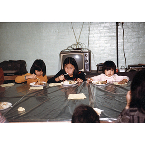 Children at a Chinese Progressive Association dinner and meeting