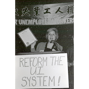 Speaker at an unemployment insurance rally