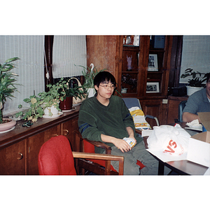 Man listening to speaker